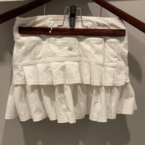 White lulu lemon tennis or running skirt.